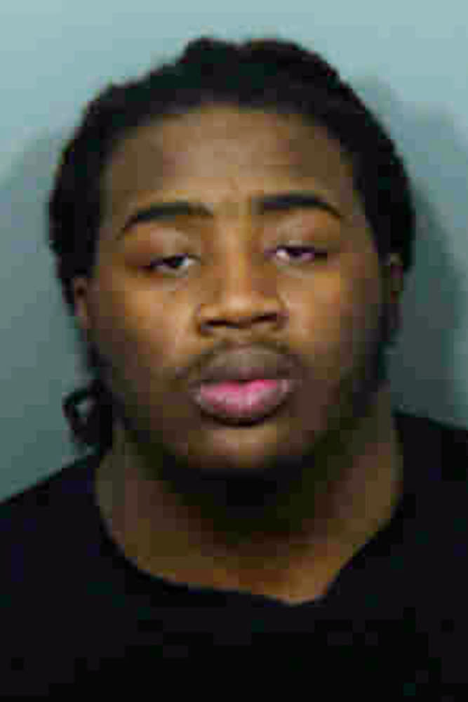 This undated photo provided by the state's attorney's office in Prince George's County, Md., shows Elijah Ford. His brother, Michael Ford, is charged with attacking a Maryland police station while his two brothers, Malik Ford and Elijah Ford videotaped the shootout, which led to an officer mistakenly killing an undercover detective. Opening statements are expected to begin Wednesday, Oct. 24, 2018, for Michael Ford’s trial in the 2016 shooting death of Prince George’s County police detective Jacai Colson. (Prince George's County State's Attorney's Office via AP)