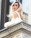 <p>Kim Kardashian brings the glamour on Sept. 22 during a photo shoot in Milan, Italy. </p>