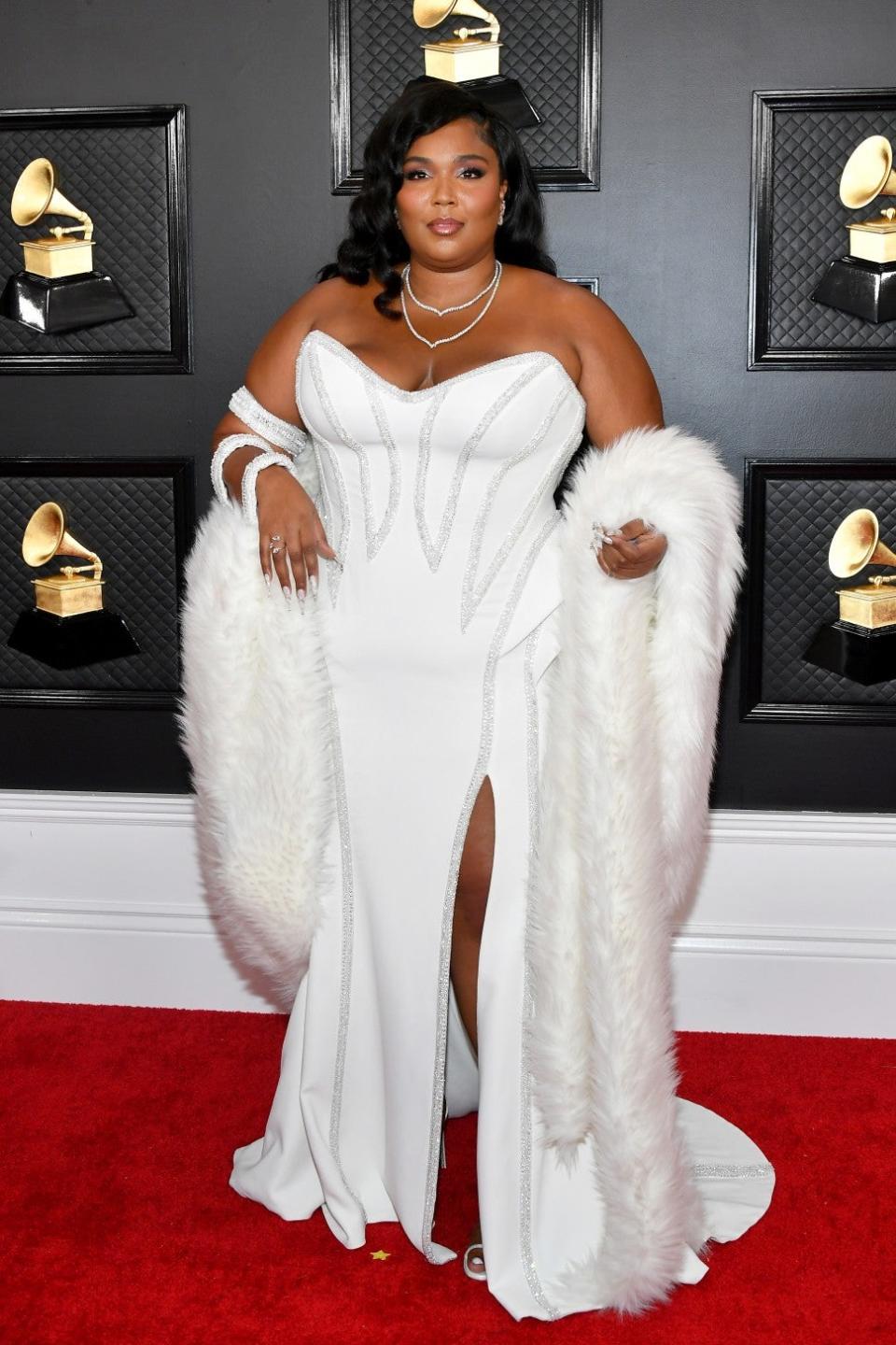 The 8-time nominee arrives on the red carpet at the 62nd annual GRAMMY Awards on Sunday.