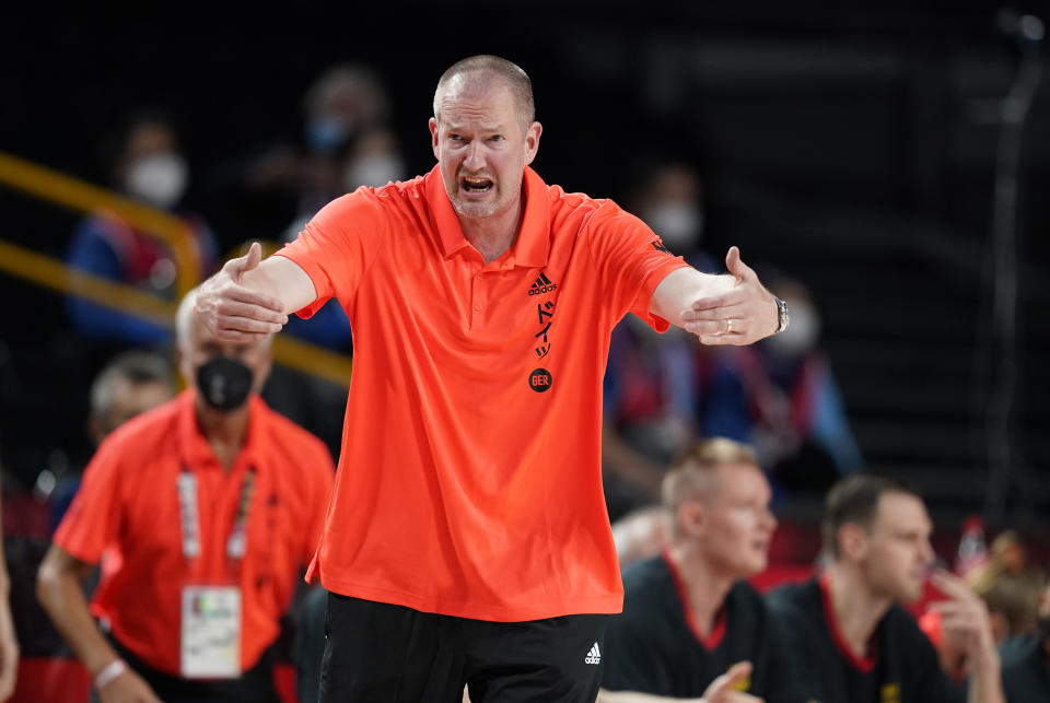 Germany head coach Henrik Rodl reacts during men's basketball preliminary round game against Italy at the 2020 Summer Olympics, Sunday, July 25, 2021, in Saitama, Japan. (AP Photo/Charlie Neibergall)