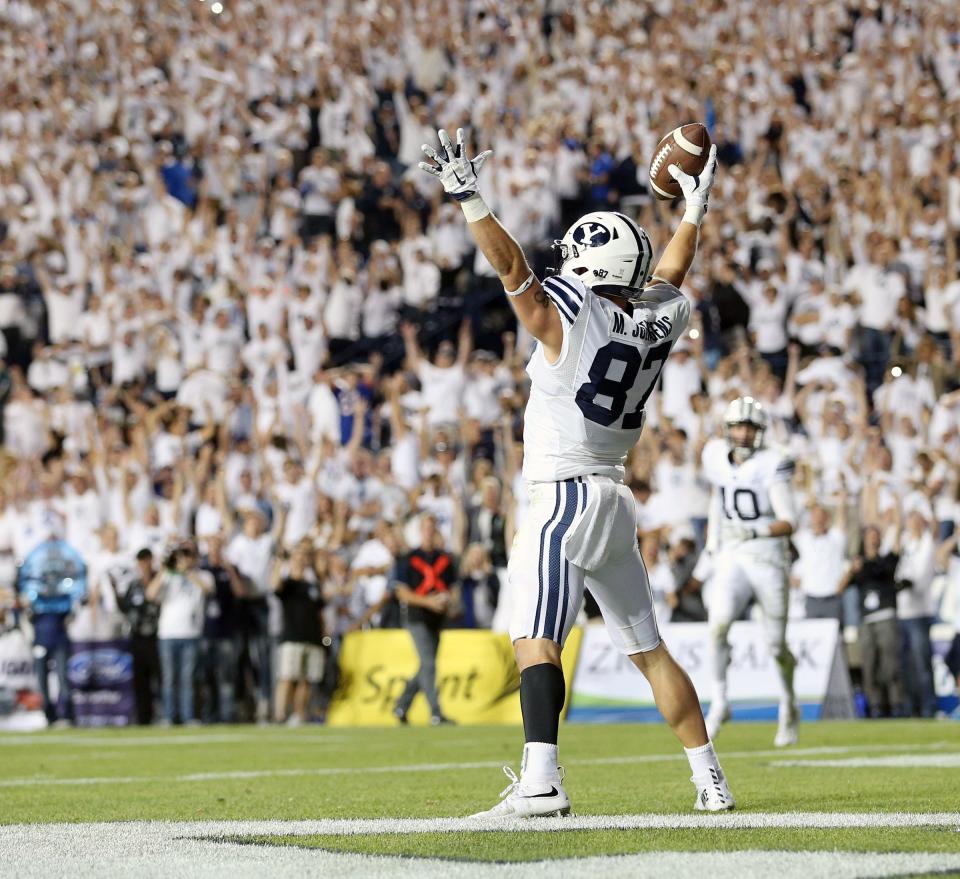 BYU receiver Mitchell Juergens celebrates his catch and score as BYU and Boise State play Saturday, Sept. 12, 2015, at LaVell Edwards Stadium in Provo. | Scott G Winterton, Deseret News