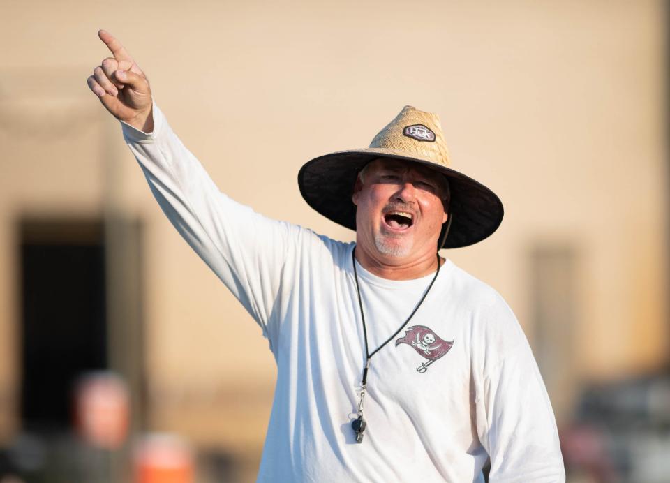 Head coach Jay Walls during football practice at Navarre High School on Wednesday, Aug. 2, 2023.