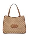 <p>This <span>Gucci 1955 Horsebit GG-Canvas and Leather Tote Bag</span> ($2,050) isn't your average canvas tote. It's elegant, with iconic details like the Gucci logo and the classic horsebit. It has a snap closure, and a an interior zip pocket.</p>