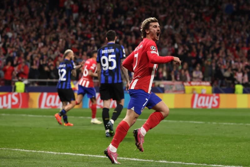 Atletico Madrid's Antoine Griezmann celebrates after scoring his side's first goal of the game during the UEFA Champions League Round of 16, second leg soccer match between Atletico Madrid and Inter Milan at Civitas Metropolitan Stadium. Jonathan Moscrop/CSM via ZUMA Press Wire/dpa