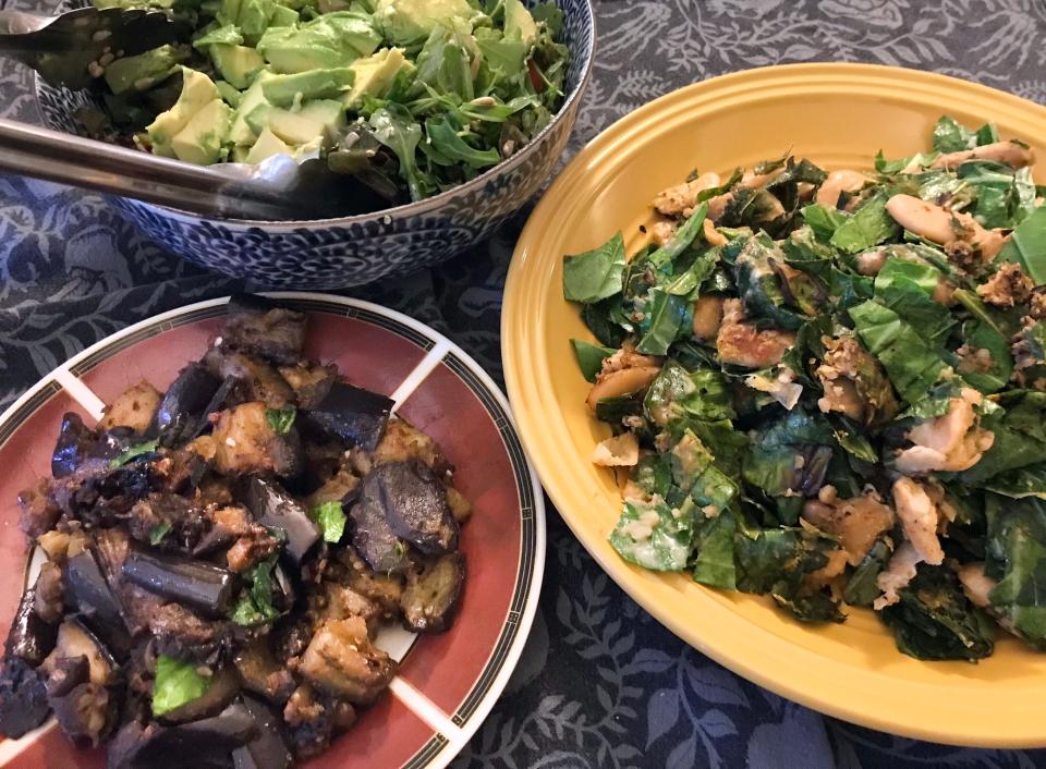 Seasoned Eggplant, at lower left, marries well with a green salad as well as a dish of collard greens and butter beans.