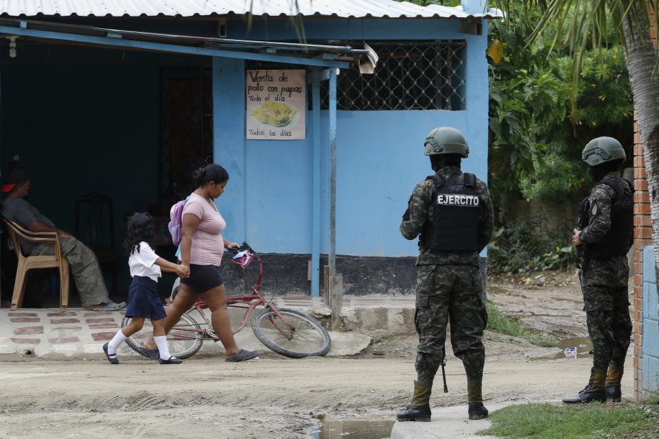 Soldiers patrol the Riviera Hernandez neighborhood in San Pedro Sula, Honduras, Tuesday, June 27, 2023. Honduran President Xiomara Castro has decreed a state of emergency in some provinces of the Central American nation, and the government distributed video Tuesday of police tearing down a cyclone fence a gang had erected in a town in northern Honduras to mark its territory. (AP Photo/Delmer Martinez)