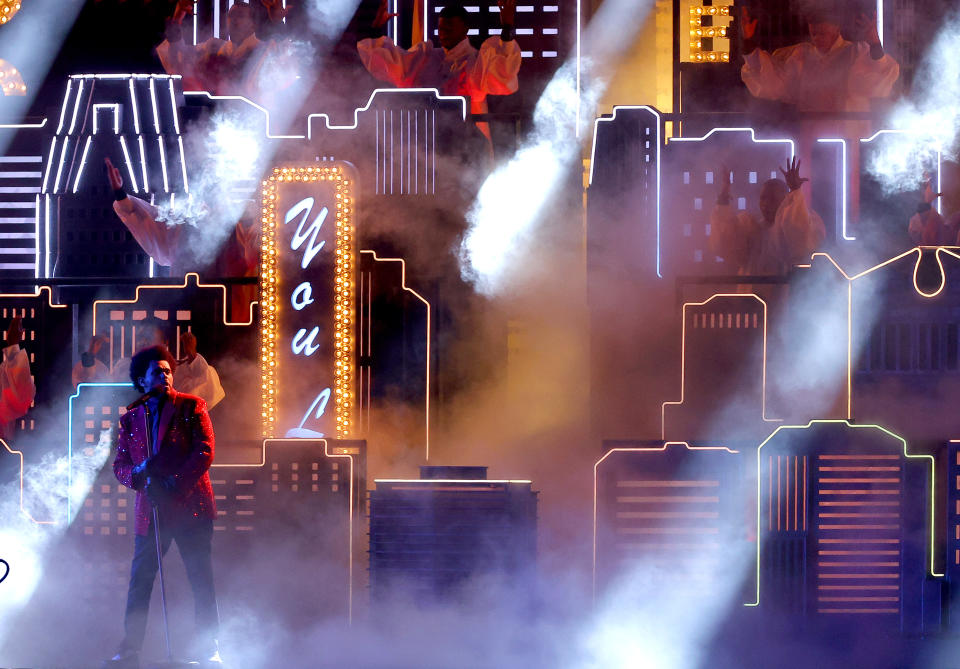 <p>TAMPA, FLORIDA - FEBRUARY 07: The Weeknd performs during the Pepsi Super Bowl LV Halftime Show at Raymond James Stadium on February 07, 2021 in Tampa, Florida. (Photo by Kevin C. Cox/Getty Images)</p> 