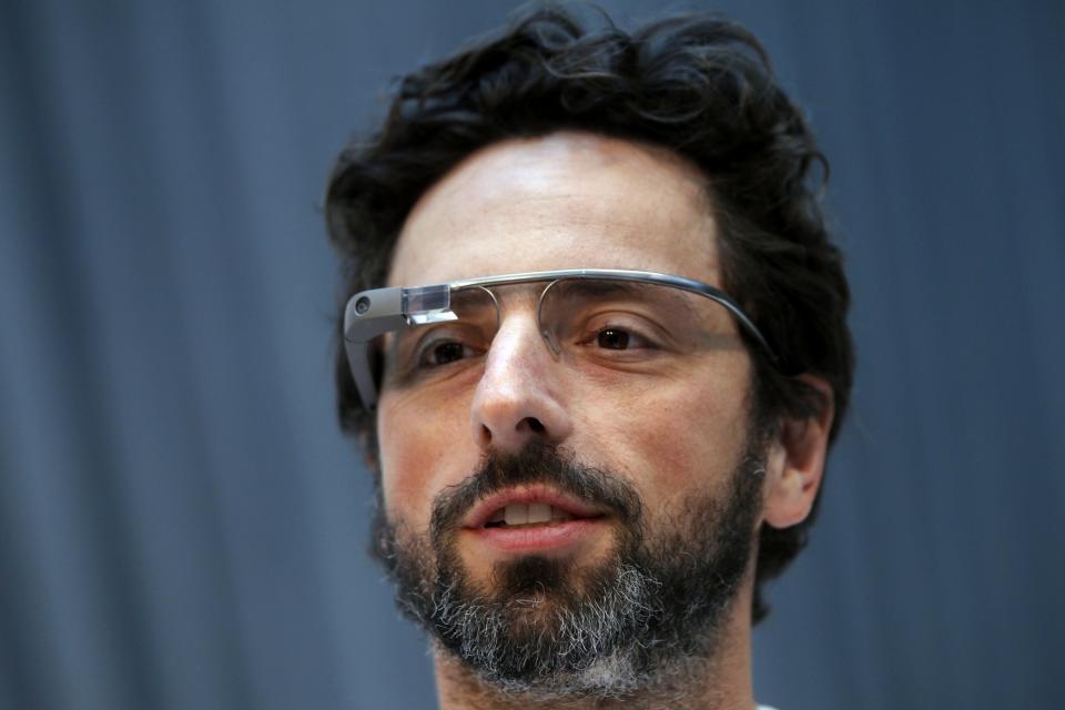 Google Inc. co-founder Sergey Brin looks on after the Life Sciences Breakthrough Prize announcement in San Francisco, California, in this February 20, 2013 file photo. On November 9, 2014, Brin, who previously never missed a high-profile opportunity to sport Google Glass, sauntered bare-faced into a Silicon Valley red-carpet event, telling a reporter he had left his pair in the car. To match Insight GOOGLE-GLASS/ REUTERS/Robert Galbraith/Files (UNITED STATES - Tags: SCIENCE TECHNOLOGY BUSINESS HEADSHOT PROFILE)