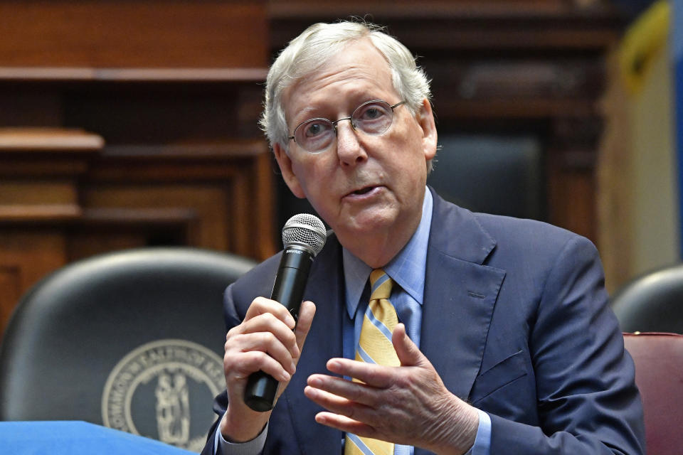 FILE - In this Oct. 7, 2019 file photo, Senate Majority Leader Mitch McConnell, R-Ky., addresses the Kentucky chapters conference of The Federalist Society at the Kentucky State Capitol in Frankfort, Ky. Retired Marine combat pilot Amy McGrath is showing her mettle as a campaign fundraiser, hauling in more than $10.7 million since starting her campaign against McConnell. McGrath has outraised the six-term Kentucky Republican so far this year, but McConnell has more campaign cash in the bank, based on their latest numbers posted by the Federal Election Commission. (AP Photo/Timothy D. Easley, File)