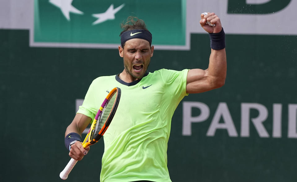 Spain's Rafael Nadal celebrates after defeating Britain's Cameron Norrie during their third round match on day 7, of the French Open tennis tournament at Roland Garros in Paris, France, Saturday, June 5, 2021. (AP Photo/Michel Euler)