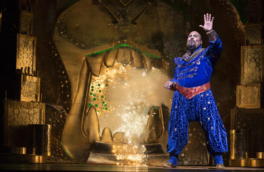 This undated image released by Disney Theatrical Productions shows James Monroe Iglehart as the Genie during a production of the musical "Aladdin." (AP Photo/Disney Theatrical Productions, Cylla von Tiedemann)