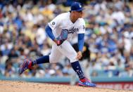 April 28, 2019; Los Angeles, CA, USA; Los Angeles Dodgers relief pitcher Julio Urias (7) throws against the Pittsburgh Pirates during the seventh inning at Dodger Stadium. Mandatory Credit: Gary A. Vasquez-USA TODAY Sports