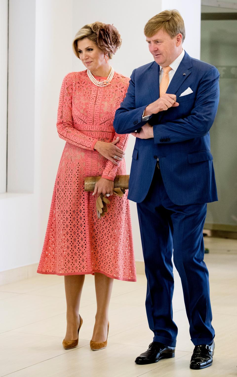 Queen Maxima of The Netherlands wears a pink dress