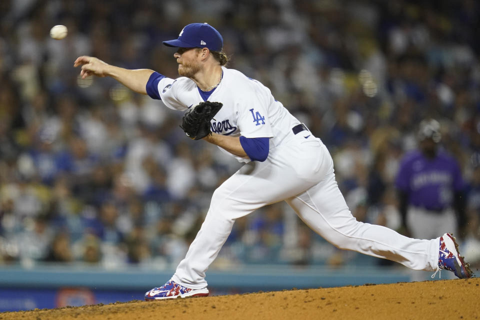 Los Angeles Dodgers relief pitcher Craig Kimbrel (46) throws during the fifth inning of a baseball game against the Colorado Rockies in Los Angeles, Monday, Oct. 3, 2022. (AP Photo/Ashley Landis)