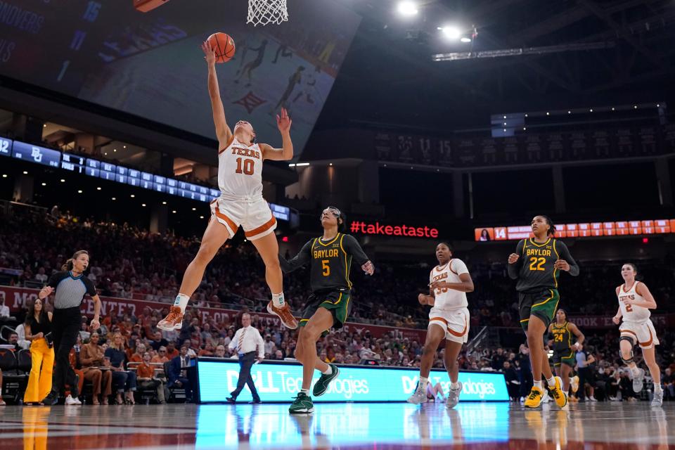 Texas guard Shay Holle scores against Baylor guard Darianna Littlepage-Buggs during a game at Moody Center on Dec. 30, 2023. Baylor took the road win that night, the Longhorns attempt to return the favor Thursday in Waco.