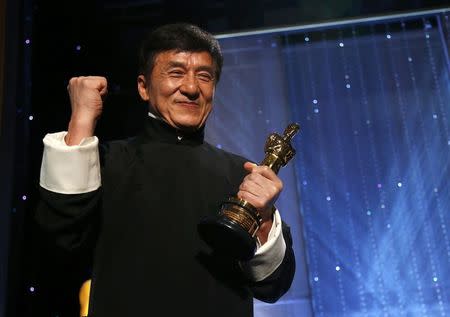 Actor Jackie Chan poses with his Honorary Award at the 8th Annual Governors Awards in Los Angeles, California, U.S., November 12, 2016. REUTERS/Mario Anzuoni