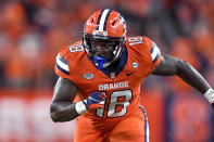 FILE - Syracuse defensive lineman Cody Roscoe defends during the second half of an NCAA college football game against Clemson in Syracuse, N.Y., in this Friday, Oct. 15, 2021, file photo. Roscoe was selected to The Associated Press Midseason All-America team, announced Tuesday, Oct. 19, 2021. (AP Photo/Adrian Kraus, File)