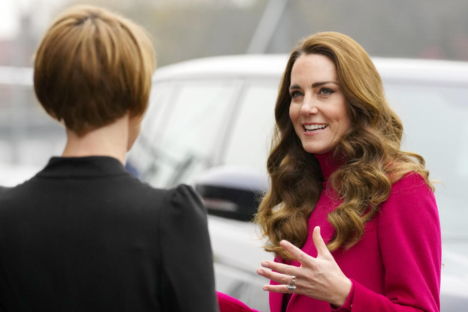 The Duchess of Cambridge (right) speaking to Dr. Elizabeth Rapa, Senior Researcher from the University of Oxford, during a visit to Nower Hill High School in Harrow, north London, to join a science lesson studying neuroscience and the importance of early childhood development. Picture date: Wednesday November 24, 2021.