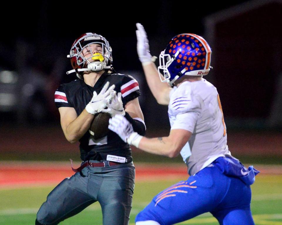 Patterson receiver Noah Cozart (2) catches a deep pass during a Division IV Sac Joaquin Section Football Playoff game between Patterson and Kimball at Patterson High School in Patterson CA on November 10, 2023.