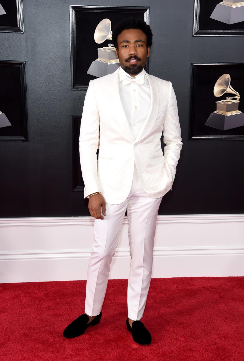 Donald Glover in Ermenegildo Zegna Couture with Tod's shoes and Tiffany & Co jewelry