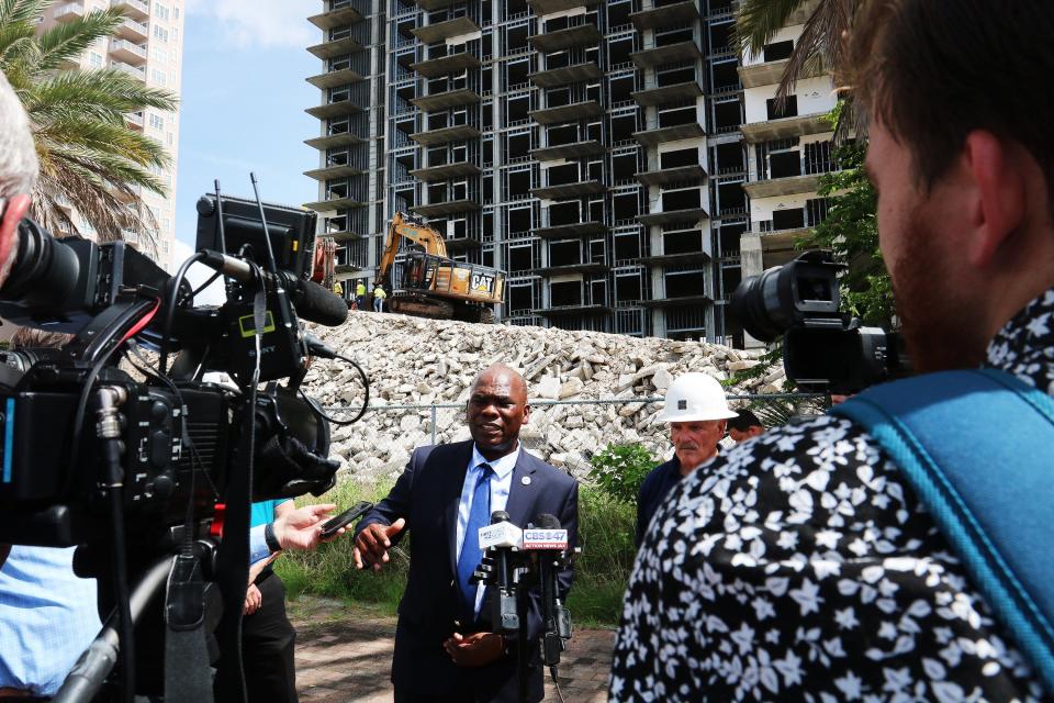 Reggie Gaffney speaks to the press during the demonstration of the destruction of the building at 500 East Bay Street Thursday, July 15, 2021.