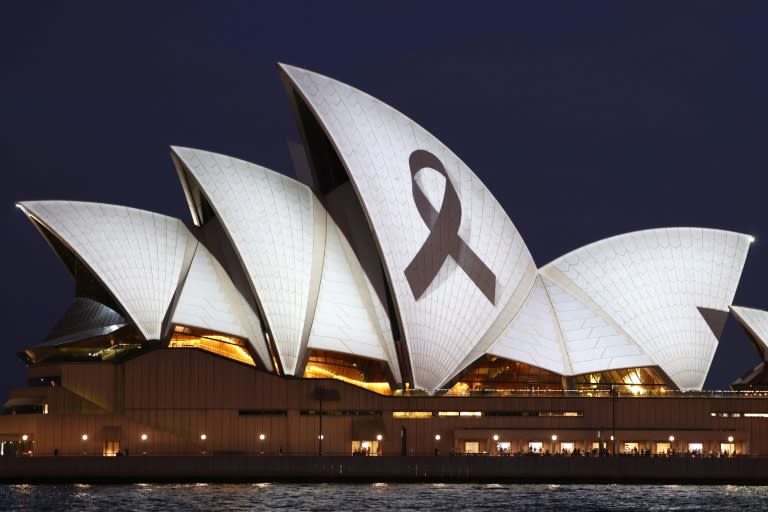 A black ribbon is projected onto the Sydney Opera House as a mark of respect for the six victims killed in a stabbing rampage in a suburban shopping mall on Saturday (DAVID GRAY)