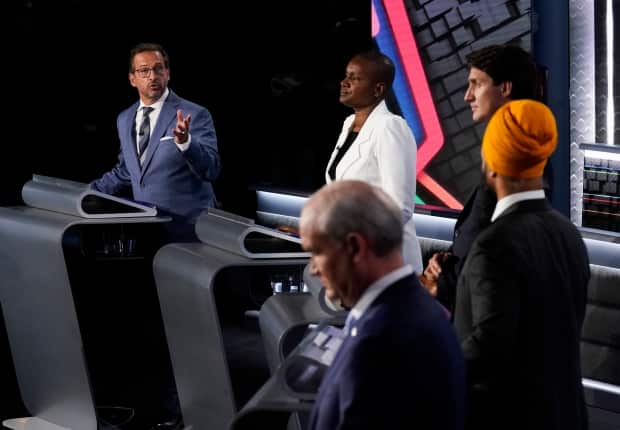 Bloc Québécois Leader Yves-François Blanchet, left to right, Green Party Leader Annamie Paul, Liberal Leader Justin Trudeau, NDP Leader Jagmeet Singh and Conservative Leader Erin O'Toole take part in the federal election English-language Leaders debate in Gatineau, Que., on Thursday. (Adrian Wyld/The Canadian Press - image credit)