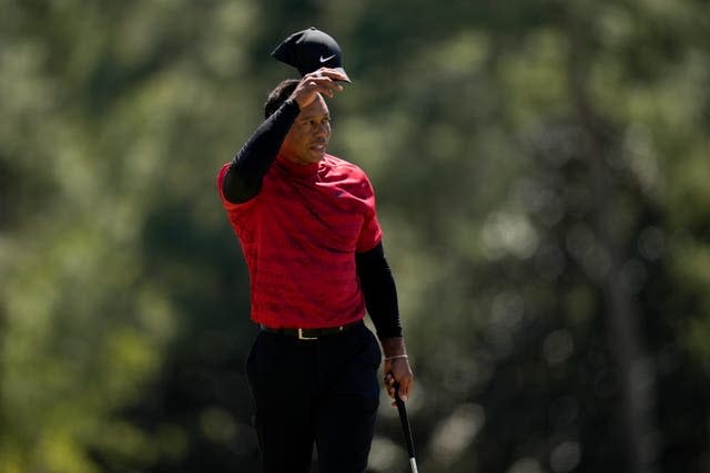 Tiger Woods acknowledges the crowd at Augusta on Sunday