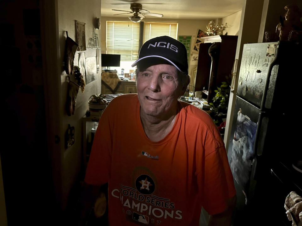72-year-old Joseph Torregrossa lives on the seventh floor of the Houston Heights Tower senior living facility, which has had only emergency generator power since Thursday night's storms, Sunday, May 19, 2024 in Houston, Texas. Electric crews restored full power and air conditioning Sunday morning. (AP Photo/Mark Vancleave)