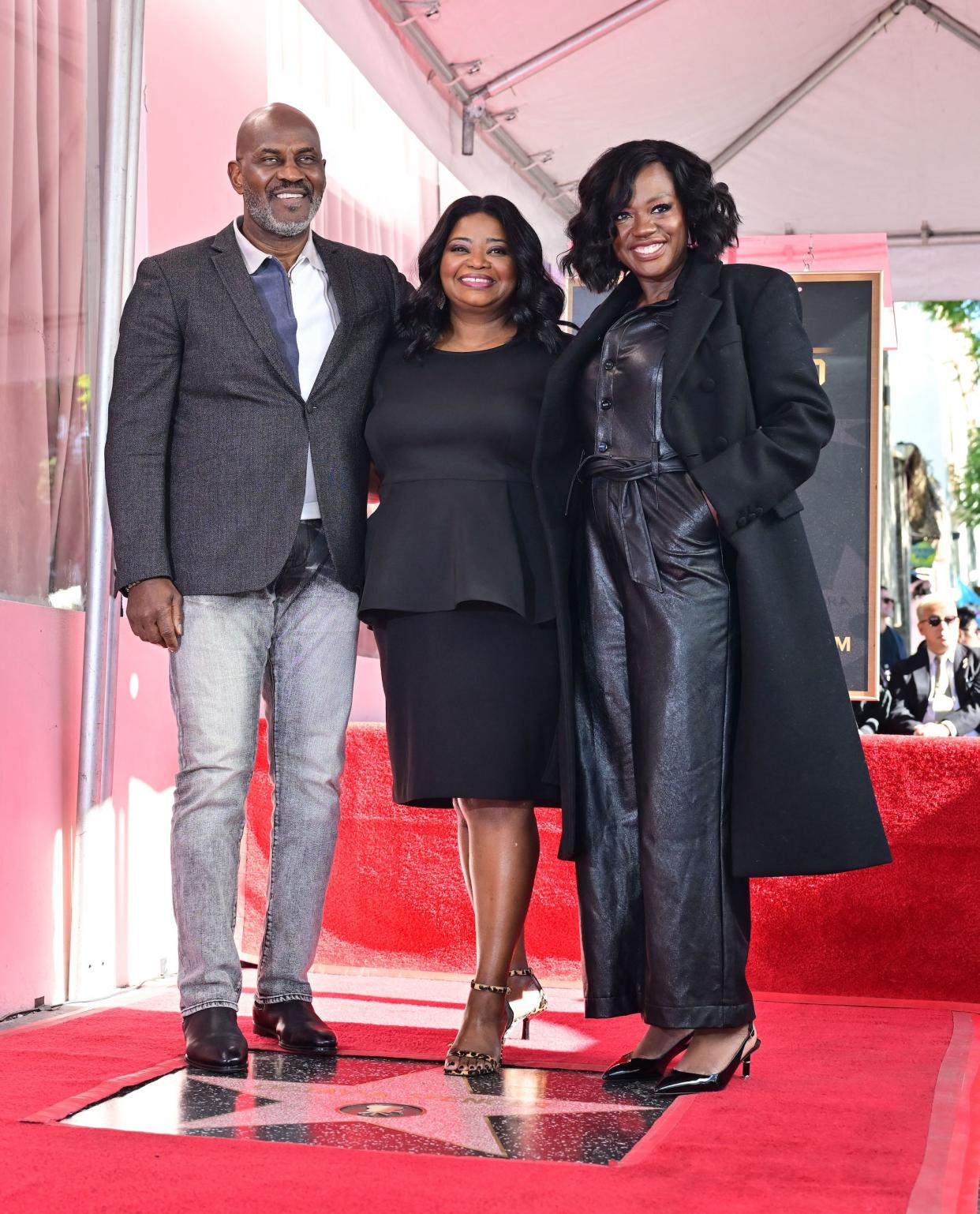 Viola Davis and her husband, Julius Tennon, posed with Spencer during the ceremony. (FREDERIC J. BROWN / AFP via Getty Images)