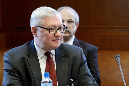 Russian Deputy Foreign Minister Sergei Ryabkov looks on at the start of two days of closed-door nuclear talks at the United Nations offices in Geneva October 15, 2013. REUTERS/Fabrice Coffrini/Pool