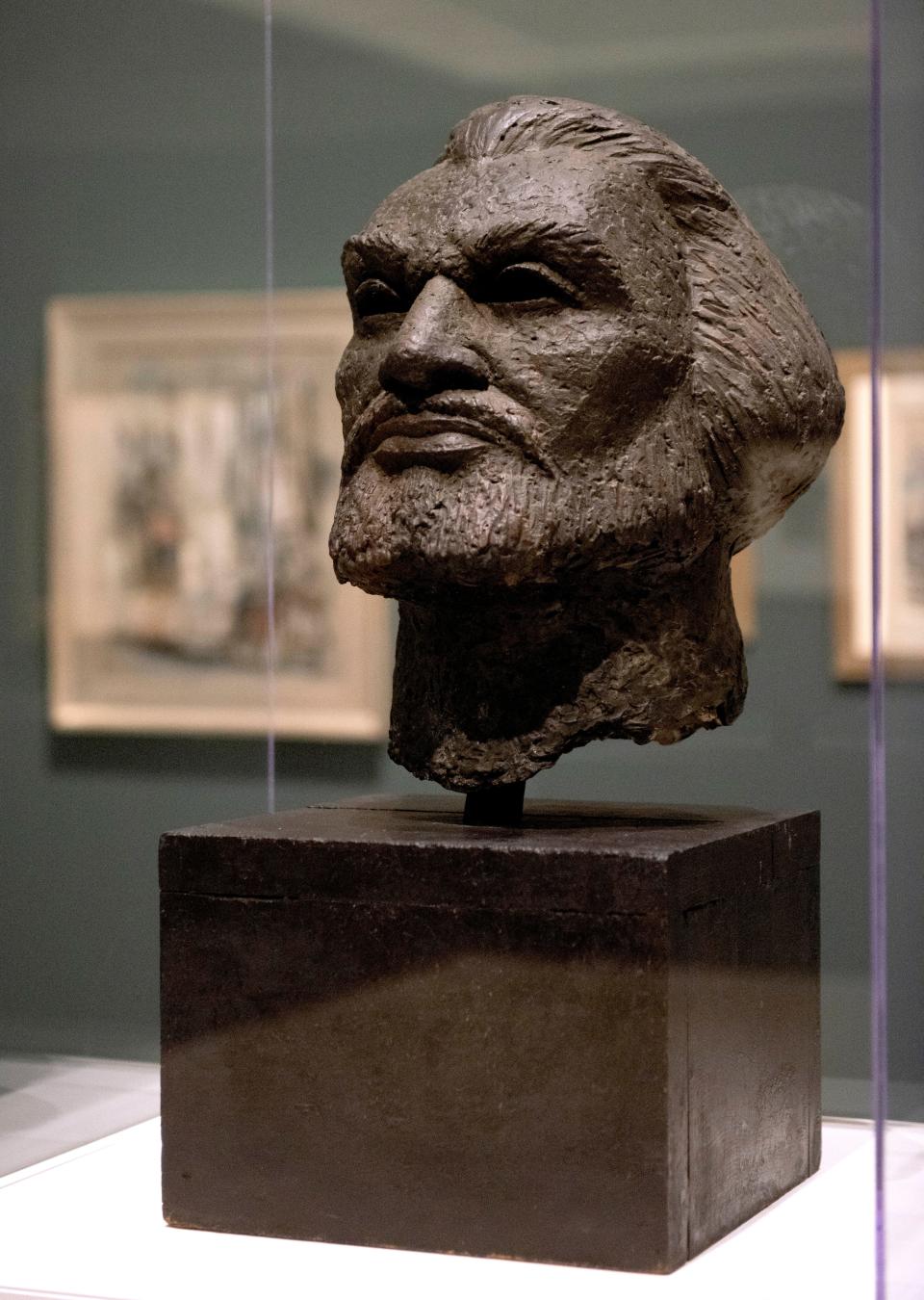 This painted plaster bust of Frederick Douglass by Henry Mike Bannarn (circa 1936) is on display in "From Man Ray to O'Keeffe: American Modernism," showing at the Norton Museum of Art from Saturday through July 16.