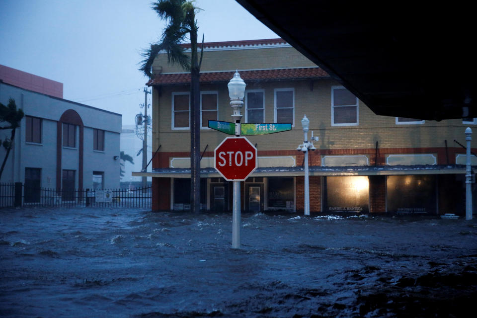 A flooded street is seen in downtown Fort Myers as Hurricane Ian makes landfall in southwestern Florida on September 28, 2022. / Credit: MARCO BELLO / REUTERS