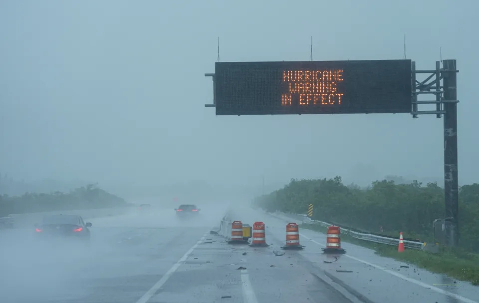 SARASOTA, FLORIDA, UNITED STATES - OCTOBER 9: A view of a sign as Hurricane Milton bears down on the Gulf Coast in Sarasota, Florida, United States on October 9, 2024. Residents of Sarasota brace for severe weather and potential evacuations. The storm, which has intensified rapidly, is expected to bring heavy rainfall, strong winds, and flooding to the area. (Photo by Lokman Vural Elibol/Anadolu via Getty Images)