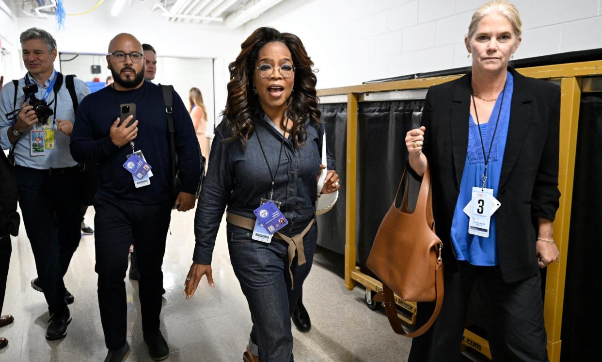 <span>Oprah Winfrey attends Democratic convention amid reports she is expected to speak.</span><span>Photograph: Vincent Alban/Reuters</span>