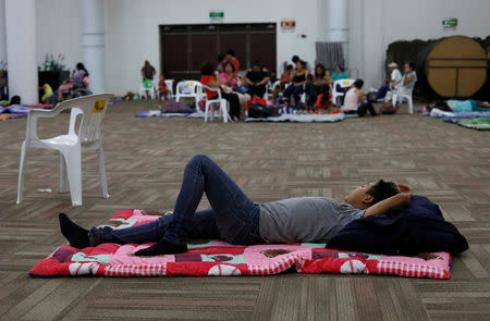 People who were evacuated from their homes are seen in a big room at the Convention Center being used as a shelter while Hurricane Willa approaches the Pacific beach resort, Mexico October 23, 2018. REUTERS/Henry Romero