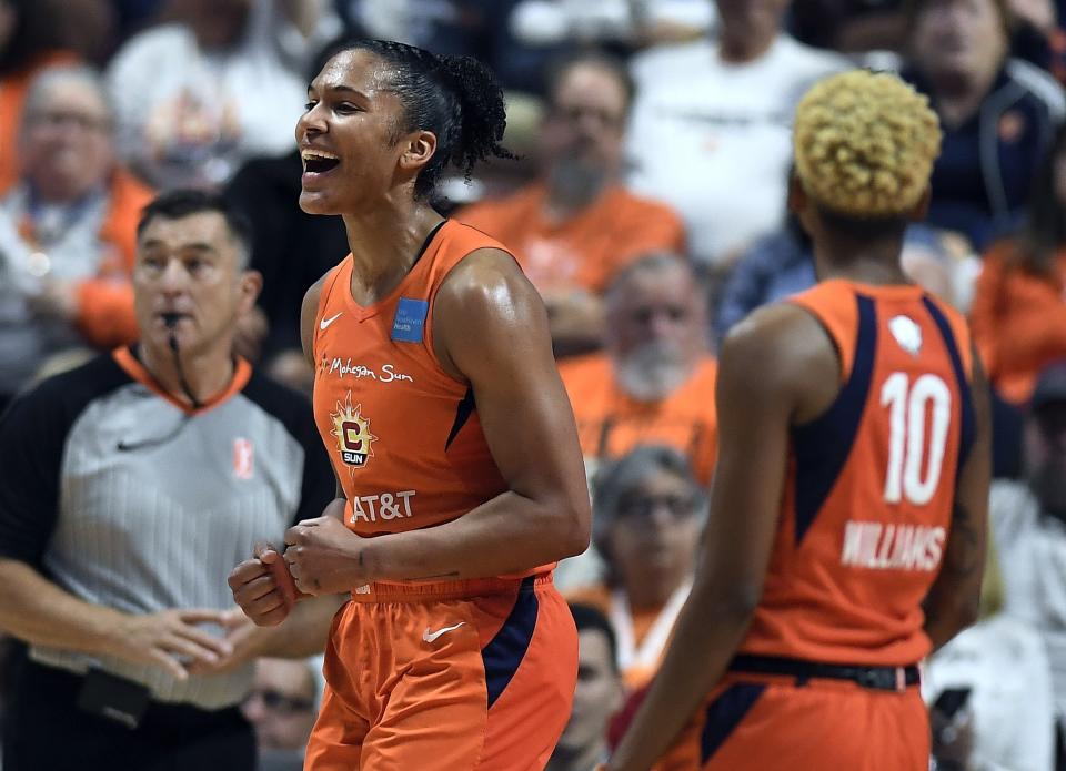 Connecticut Sun's Alyssa Thomas reacts to a play during the first half in Game 4 of basketball's WNBA Finals against the Washington Mystics, Tuesday, Oct. 8, 2019, in Uncasville, Conn. (AP Photo/Jessica Hill)