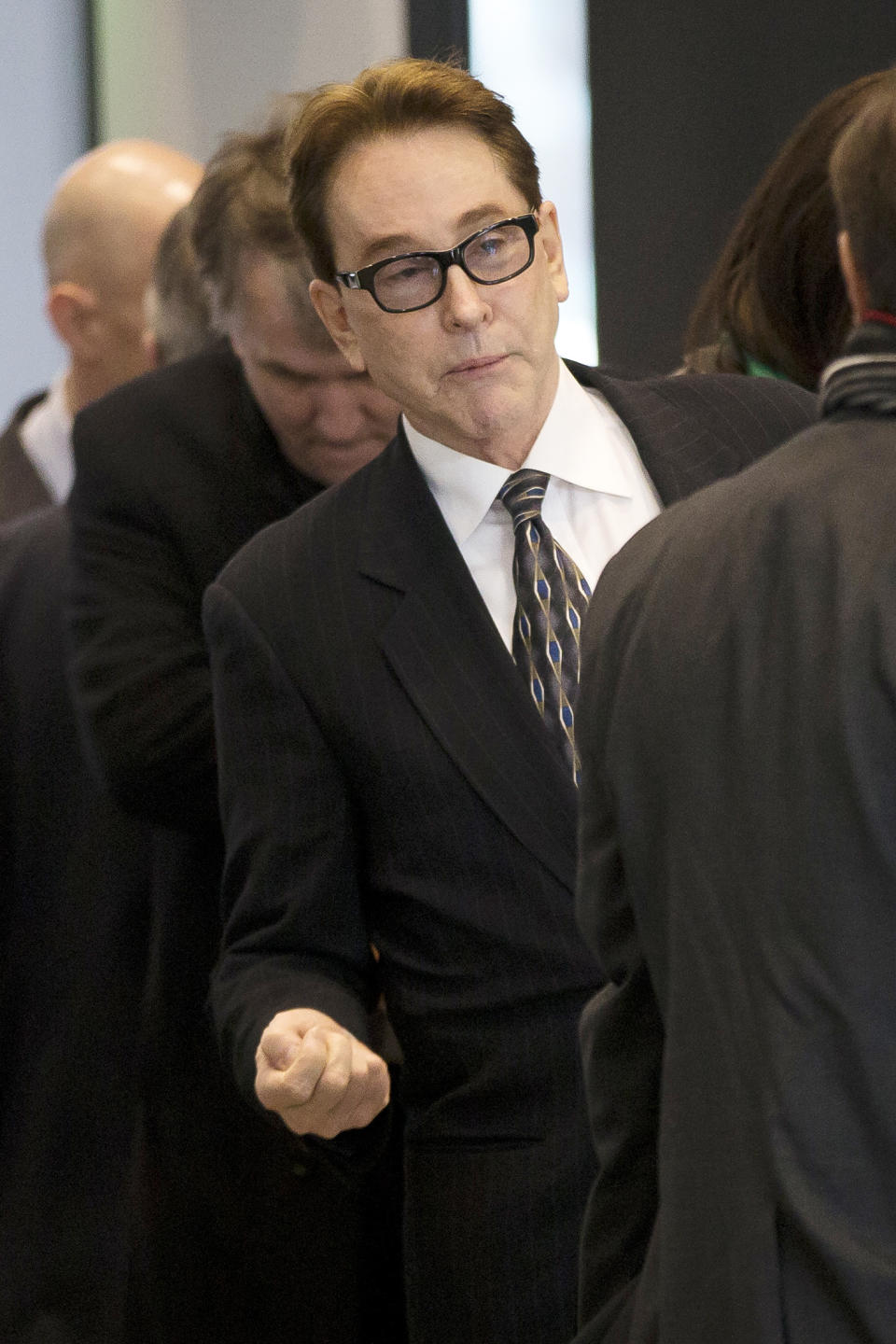 H. Ty Warner, the billionaire who created Beanie Babies, arrives at federal court for sentencing on Tuesday, Jan. 14, 2014, in Chicago. Last year Warner pleaded guilty to one count of tax evasion for hiding $25 million in income in secret Swiss bank accounts. (AP Photo/Andrew A. Nelles)