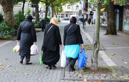 Turkish women go shopping in Marxloh, a suburb of the Social Democratic party SPD former stronghold city Duisburg known for its steel workers in Duisburg, Germany, September 13, 2017. REUTERS/Wolfgang Rattay