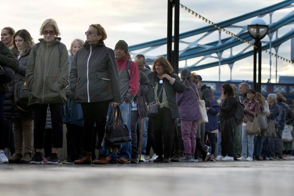 Tower Bridge crowds slowly move forward (AP)