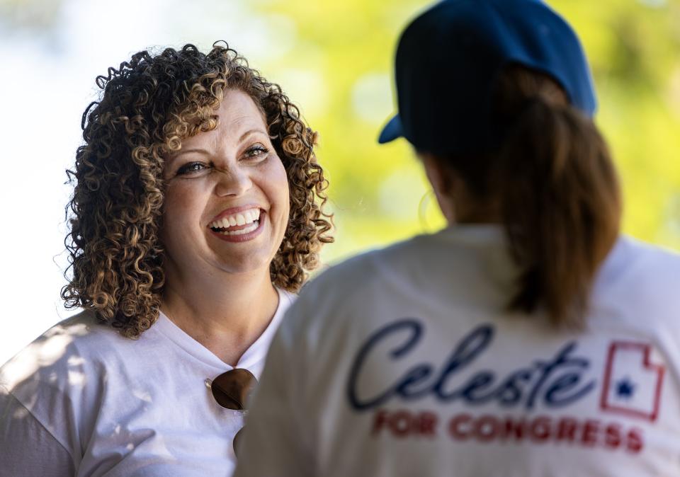 Celeste Maloy, congressional candidate, smiles at her campaign manager, Rhonda Perkes, as they talk prior to participating in a parade in Farmington on Saturday, July 15, 2023. | Scott G Winterton, Deseret News