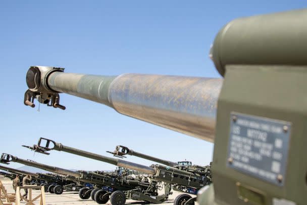 PHOTO: U.S. Marine Corps M777 towed 155 mm howitzers are staged on the flight line prior to being loaded onto a U.S. Air Force C-17 Globemaster III aircraft bound for Europe for delivery to Ukrainian forces, at March Air Reserve Base, April 22, 2022. (Cpl. Austin Fraley/U.S. Marines via Reuters)