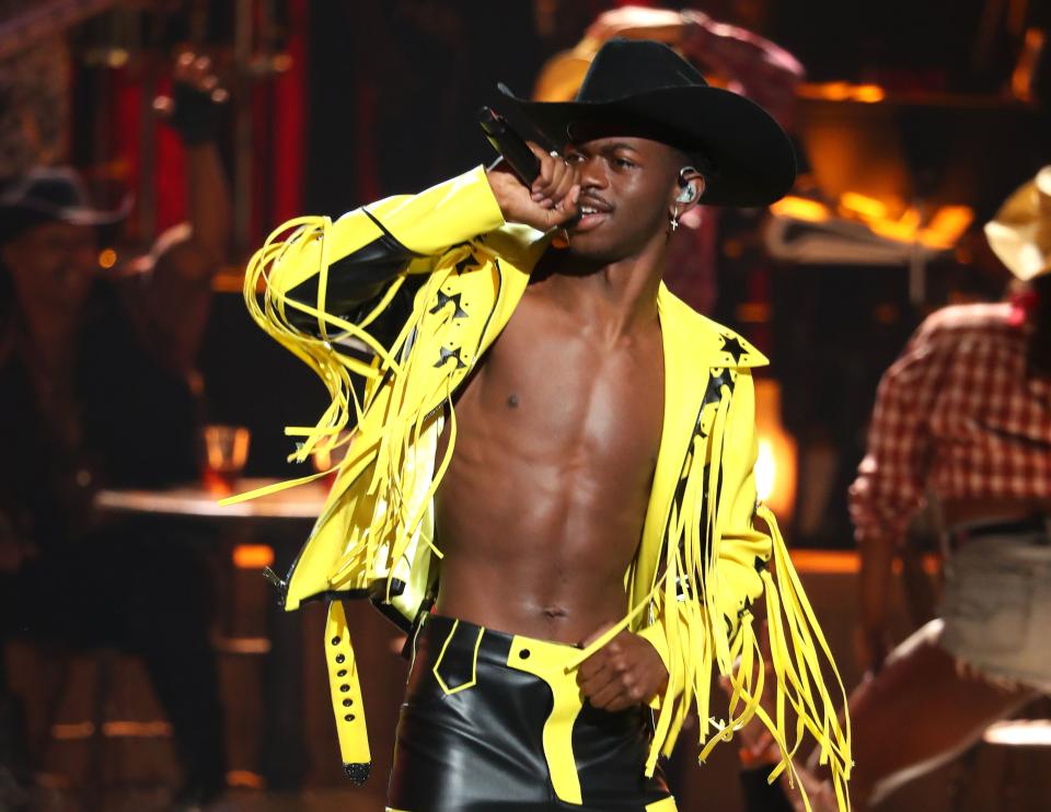 Lil Nas X performs onstage during the 2019 BET awards at Microsoft Theater in Los Angeles, California on June 23, 2019. (Photo by Jean-Baptiste LACROIX / AFP)        (Photo credit should read JEAN-BAPTISTE LACROIX/AFP/Getty Images)