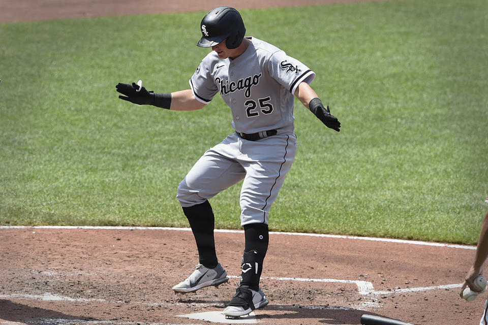 Chicago White Sox's Andrew Vaughn steps on the plate after hitting a three-run home run against the Baltimore Orioles In the sixth inning of a baseball game, July 11, 2021 in Baltimore.(AP Photo/Gail Burton)