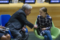 FILE - In this Saturday, Sept. 21, 2019 file photo Swedish environmental activist Greta Thunberg, right, shakes hands with U.N. Secretary-General Antonio Guterres, during the Youth Climate Summit at United Nations headquarters. In his General Assembly opening address on Tuesday, Sept. 21, 2021, U.N. Secretary-General Antonio Guterres practically scolded world leaders for disappointing young people with a perceived inaction on climate change, inequalities and the lack of educational opportunities, among other issues important to young people.(AP Photo/Eduardo Munoz Alvarez, file)