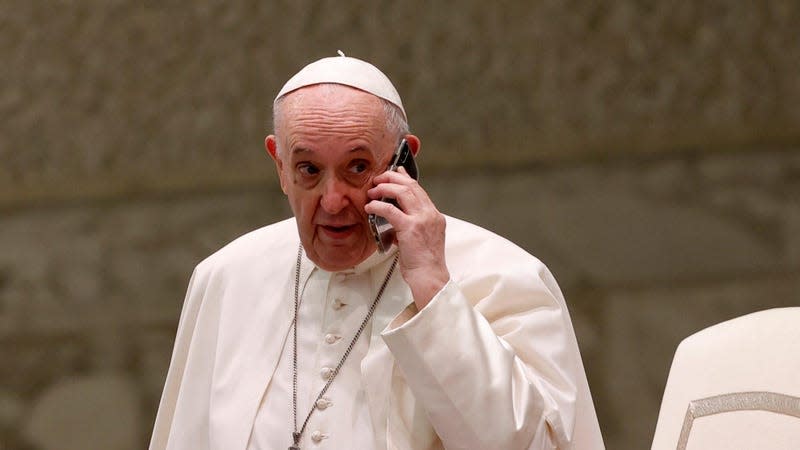 The Pope using a smartphone