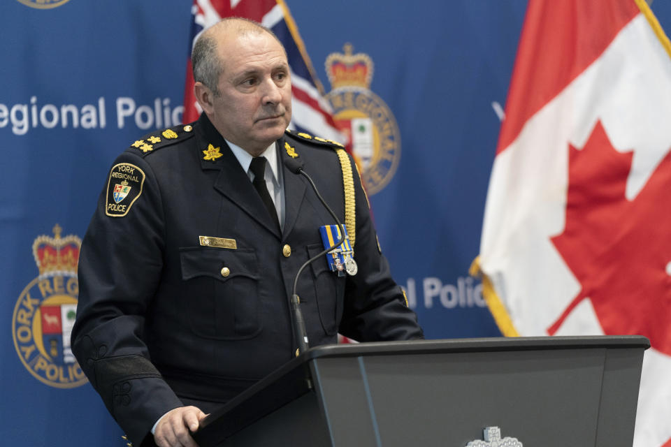 York Regional Police Chief Jim MacSween speaks to the media during a press conference in Aurora, Ontario, on Monday Dec, 19, 2022. Canadian authorities say the man who killed five people and wounded a sixth at a condominium building near Toronto before an officer killed him was a 73-year-old resident, Francesco Velli. (Arlyn McAdorey/The Canadian Press via AP)