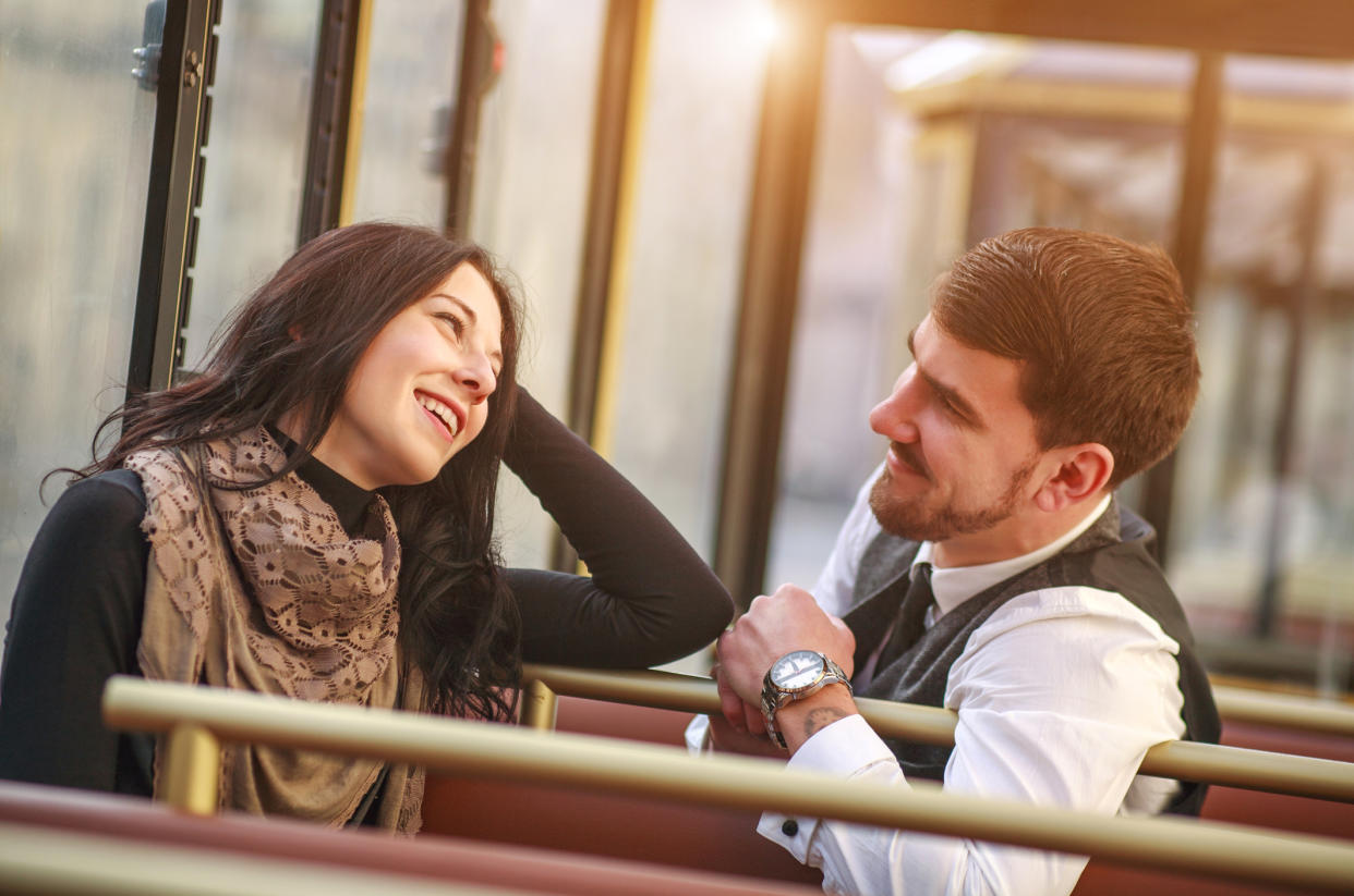 Couple smiling together (Getty Images)