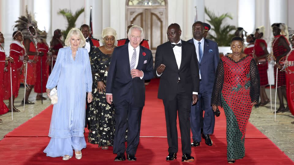 King Charles and Queen Camilla walk with Kenyan President William Ruto and Kenyan First Lady Rachel Ruto as they arrive at the state banquet in Nairobi on October 31. - Chris Jackson/Pool/AFP/Getty Images
