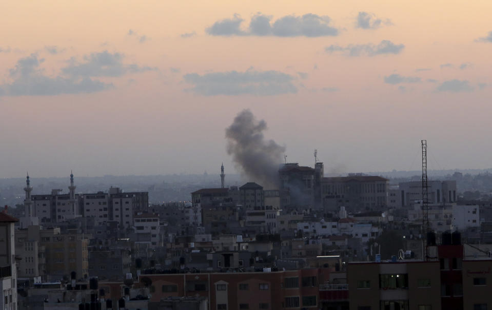 Smoke rises following Israeli strikes on Gaza City, Monday, Nov. 12, 2018. Palestinian militants on Monday fired dozens of rockets and mortar shells into southern Israel, critically wounding an Israeli teen, in an intense barrage of projectiles aimed at seeking revenge for a deadly Israeli military incursion late Sunday. The Israeli military responded by dispatching fighter jets to strike throughout the Gaza Strip. (AP Photo/Adel Hana) (AP Photo/Adel Hana)